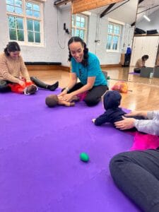 Parent and Baby class with teacher, parents and babies